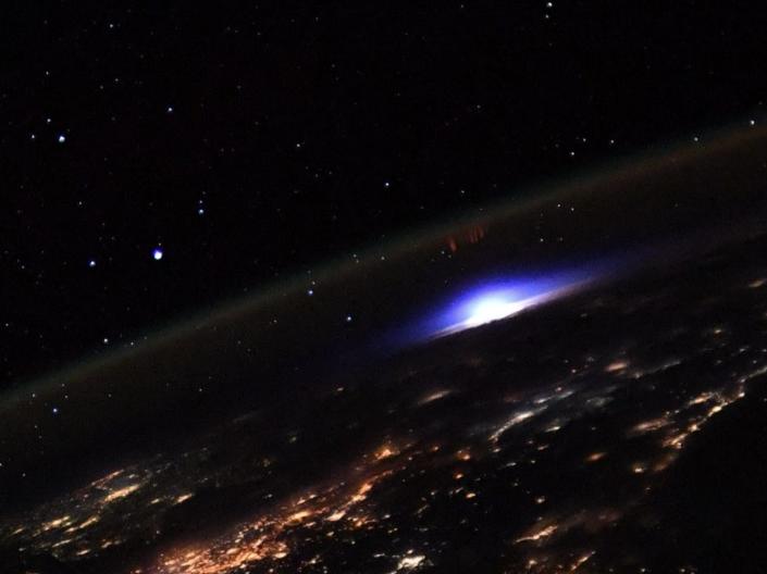 A picture of a lightning storm and a sprite snapped from the ISS.