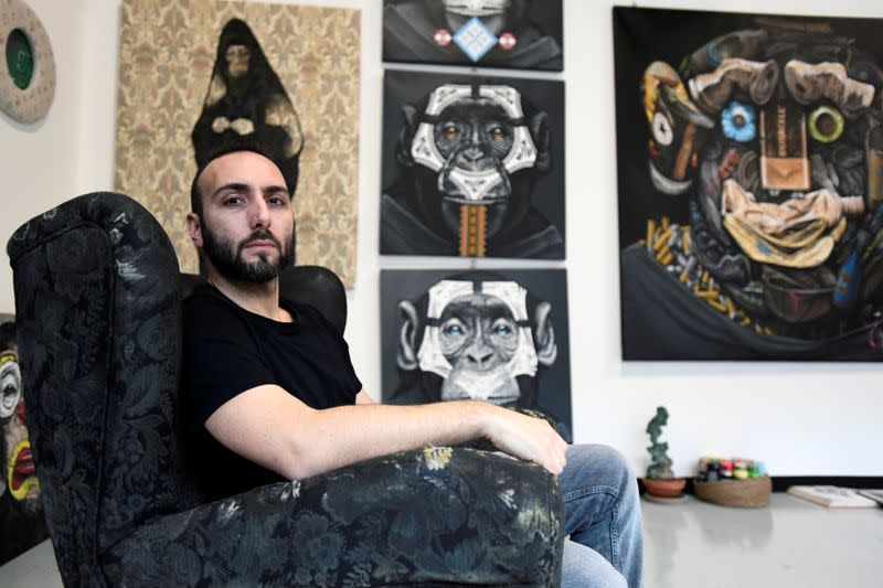 Italian artist Simone Fugazzotto poses in Milan