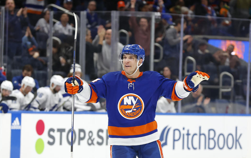 New York Islanders center Bo Horvat celebrates after scoring against the Tampa Bay Lightning during the second period of an NHL hockey game, Thursday, Feb. 8, 2024, in New York. (AP Photo/Noah K. Murray)