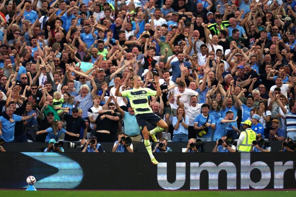Erling Haaland celebrates after scoring his first goals in the Premier League on his league debut for Manchester City(John Walton/PA) (PA Wire)