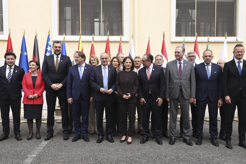 Foreign Ministers and other officials pose for a family photo during a summit in Tirana, Albania, Friday, Oct. 6, 2023. Foreign Ministers of the Western Balkans and the European Union member countries in the Berlin process, trying to raise up regional cooperation in their march toward becoming block members in the future, convene in Tirana to prepare the summit which is held in a non-EU member country. (AP Photo/Franc Zhurda)