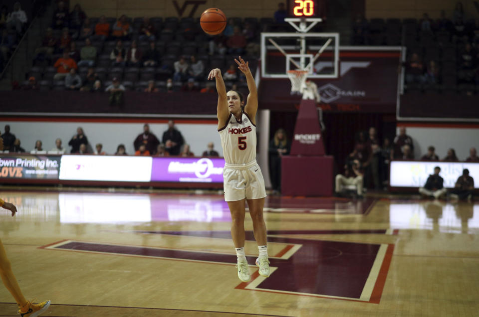 Virginia Tech's Georgia Amoore (5) attempts a 3-point basket in the first half of an NCAA college basketball game against UNC-Greensboro in Blacksburg, Va., Monday, Nov. 20 2023. (Matt Gentry/The Roanoke Times via AP)