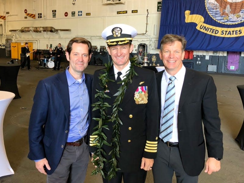 Left to right: Brett Odom, Brett Crozier and Mark Roppolo at the USS Teddy Roosevelt change of command on Nov. 1, 2019, in Coronado, California.