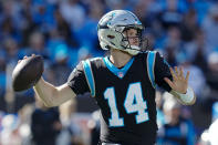 Carolina Panthers quarterback Sam Darnold passes during the first half of an NFL football game between the Carolina Panthers and the Denver Broncos on Sunday, Nov. 27, 2022, in Charlotte, N.C. (AP Photo/Rusty Jones)