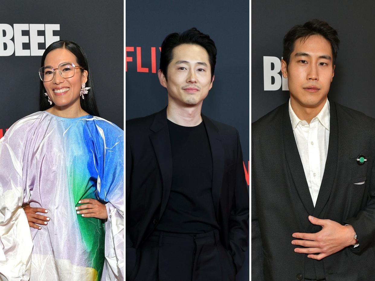 ali wong (left), steven yeun (center), and young mazino (right) on the red carpet of beef