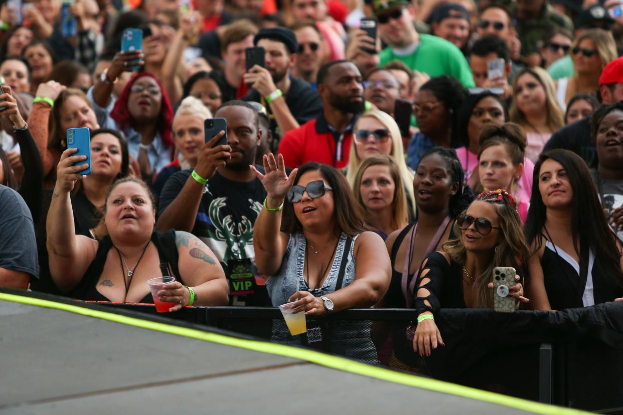 Fans watch the stage at the Tacos and Tequila Festival at Franklin Field on Saturday, Sept. 16, 2023.