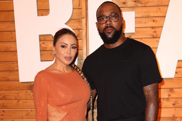 <p>Alexander Tamargo/Getty</p> Larsa Pippen and Marcus Jordan attend American Express Presents CARBONE BEACH on May 7, 2023 in Miami Beach, Florida.
