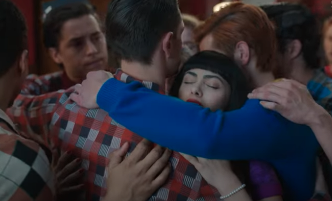 Whole lotta love: It's all over for Archie and the gang in the series 'Riverdale.' (CW)