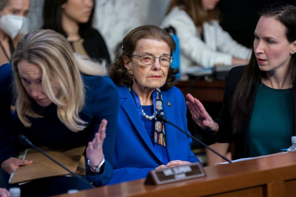 Sen. Dianne Feinstein, D-Calif., is flanked by aides as she returns to the Senate Judiciary Committee following a more than two-month absence after being treated for a case of shingles, at the Capitol in Washington, Thursday, May 11, 2023. (AP Photo/J. Scott Applewhite, File)