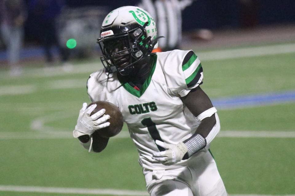 Clear Fork's Pawie Ault runs with the football during the Mid Ohio Athletic Conference championship game at Highland last week.