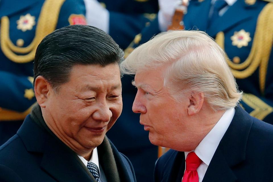 El presidente chino, Xi Jinping, y el presidente Donald Trump en Beijing, el 9 de mayo de 2019.