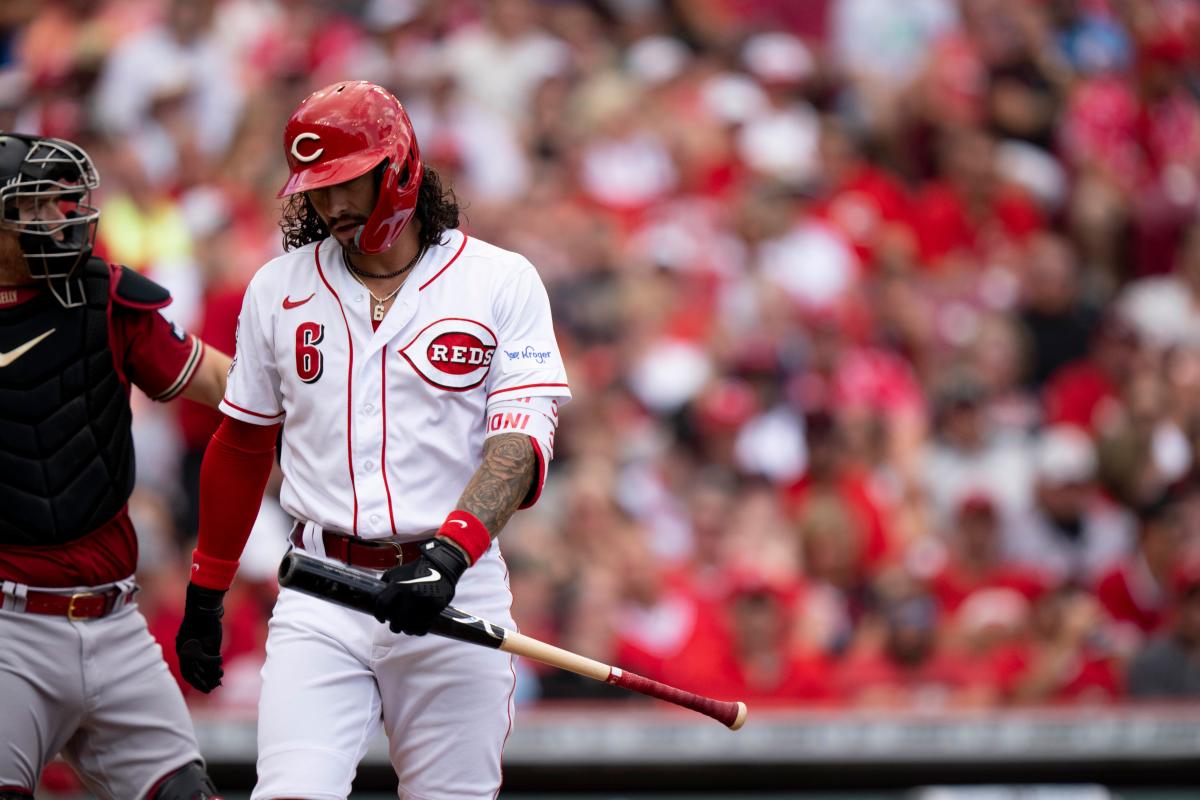 Cincinnati Reds' Jonathan India, left, receives the Major League