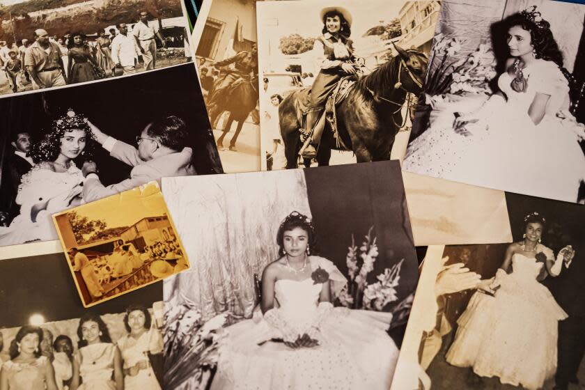 PAPANTLA, MEXICO -- AUGUST 25, 2023: Old photos of Alma Rosa Gonz‡lez Herrera, when she was crowned with during a corpus cristi event when she was 18, in Papantla, Mexico, Friday, Aug. 25, 2023. In Papantla, Othe city that perfumes the world,O reinas, or queens, of festivals are anointed with crowns woven from the vanilla orchidOs thick brown stems. The tradition honors the indigenous people who first cultivated the vanilla planifolia. The Totonacas first cultivated vanilla planifolia, an orchid species, and the spice became a favorite of Aztec nobility after they conquered the Totonacas in what century. After the Spanish arrived, MexicoOs vanilla spread farther N and Papantla gained international fame. Mexico may no longer be the leader of the global vanilla trade N Madagascar produces more and many farmers turned to oil field jobs N but in Papantla, the spice still reigns. (MARCUS YAM / LOS ANGELES TIMES)