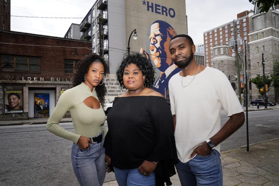 (L to R) Black Lives Matter Global Network Foundation board members D’Zhane Parker, Cicley Gay and Shalomyah Bowers earlier this year in Atlanta. The foundation launched a new relief fund on Dec. 12, 2022 aimed at Black college students, alumni and dropouts overburdened by mounting education costs and student loan debt. (AP Photo/Brynn Anderson, file)