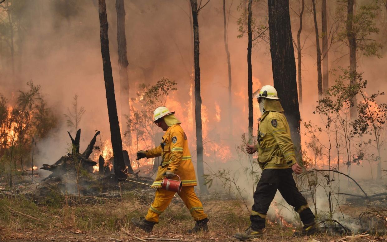 Fires have ripped through an area that is three times the size of Wales - AFP