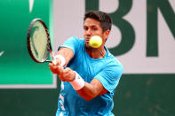 Fernando Verdasco of Spain plays a forehand during his mens singles first round match against Daniel Evans of Great Britain during Day three of the 2019 French Open at Roland Garros on May 28, 2019 in Paris, France. (Photo by Clive Brunskill/Getty Images)
