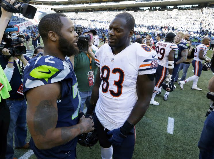 Michael Bennett (left) and his brother Martellus (AP)