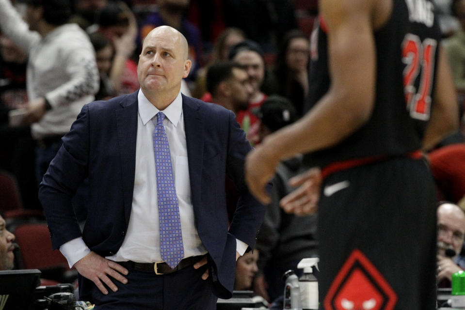 Chicago Bulls head coach Jim Boylen looks up the scoreboard during the second half of an NBA basketball game against the Phoenix Suns in Chicago, Saturday, Feb. 22, 2020. (AP Photo/Nam Y. Huh)