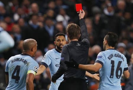 Football - Manchester City v FC Barcelona - UEFA Champions League Second Round First Leg - Etihad Stadium, Manchester, England - 24/2/15 Manchester City's Gael Clichy is shown a red card by referee Felix Brych Action Images via Reuters / Jason Cairnduff Livepic EDITORIAL USE ONLY. - RTR4R0YM