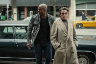 <p>Ian McShane as Mr. Wednesday and Ricky Whittle as Shadow Moon in Starz’s <i>American Gods</i>.<br><br>(Photo: Starz) </p>