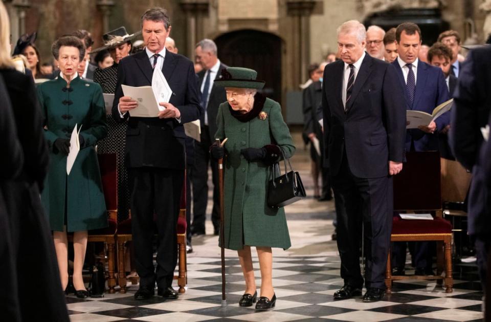 Britain's Queen Elizabeth, accompanied by Prince Andrew, Duke of York, attends a service of thanksgiving for late Prince Philip, Duke of Edinburgh, at Westminster Abbey in London, Britain, March 29, 2022.