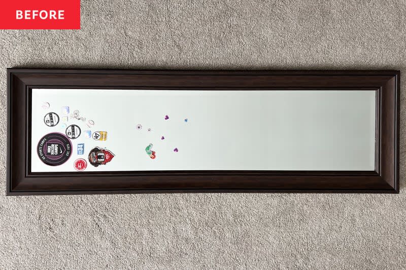 Full length framed mirror with stickers on it before makeover