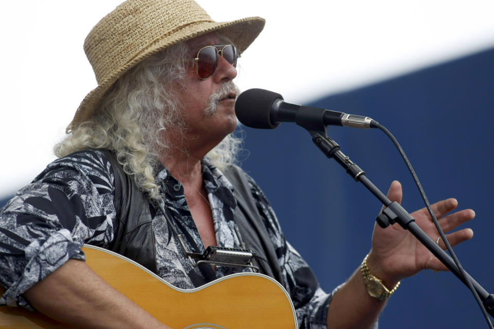 FILE - In this Aug. 2, 2009 file photo, Arlo Guthrie performs at George Wein's Newport Folk Festival in Newport, R.I. Guthrie is scheduled to play again at the 2012 Newport Folk Festival. (AP Photo/Joe Giblin, File)