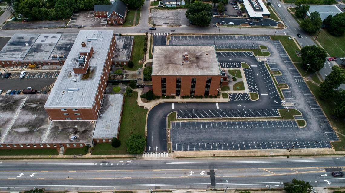 The former North Carolina Division of Motor Vehicles headquarters sits empty at the intersection Tarboro Street and New Bern Avenue east of downtown Raleigh June 11, 2021. After the headquarters was moved to Rocky Mount last fall, private developers and city leaders have expressed interest in the property.