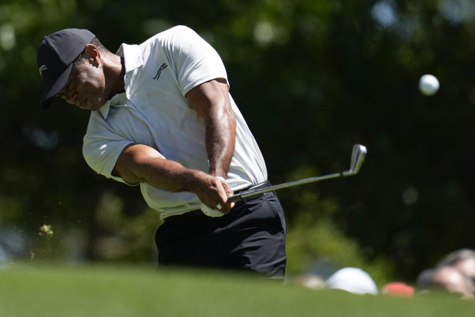 Tiger Woods hits his tee shot on the fourth hole during third round at the Masters golf tournament at Augusta National Golf Club Saturday, April 13, 2024, in Augusta, Ga. (AP Photo/Ashley Landis)