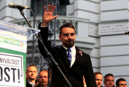 Chairman of the Hungarian right wing opposition party Jobbik Gabor Vona waves after his speech at a rally during Hungary's National Day celebrations, which also commemorates the 1848 Hungarian Revolution against the Habsburg monarchy, in Budapest, Hungary March 15, 2018. Picture taken March 15, 2018. REUTERS/Bernadett Szabo