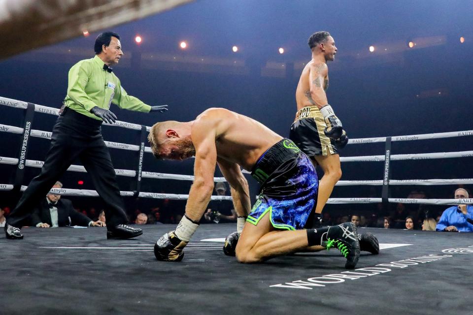 Oct 27, 2018; New Orleans, LA, USA; Regis Prograis knocks down Terry Flanagan during the quarter final bout of the World Boxing Super Series at UNO Lakefront Arena. Mandatory Credit: Stephen Lew-USA TODAY Sports/Sipa USA