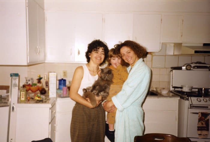 Mama Lu, me, and Mama Flavia in November 1995. We had recently moved into this house. This house then became the home that Mama Lu, my abuelita, and I lived in. Growing up, this multi-generational house was not very big but it held many. It was a dreaded brown and white on the facade of the house while the inside had a different color on each wall from warm mango to deep red to earth blue. I have memories of family lunches with loud conversations in Spanish, memories of my abuelita making Peruvian <em>cau cau de pollo con arroz </em>while the sounds of activists on KPOO radio or Latin American music weaved through the house. Memories of peace lilies and bamboo plants, cigarette stubs and photographs of Peruvian friends, indigenous artwork, and hundreds of vinyl albums that were scratched up by our old cat Lulu. In my memories, my abuelita is still in that house praying in the corner of her bright yellow room telling her God to protect our family.<span class="copyright">Quetzal Maucci</span>