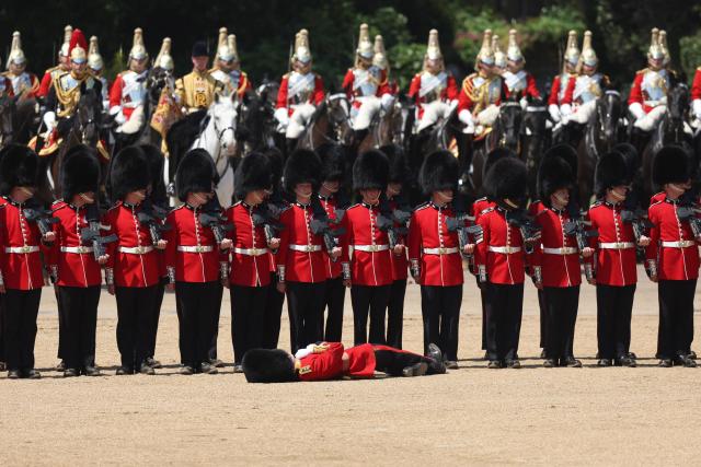 Soldier helped by police after fainting at King's first Order of