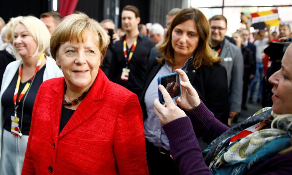 Angela Merkel arrives for an election rally.