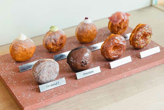<p>I'm Donut</p> A few of the regular flavors at Japan's I'm Donut location on display.