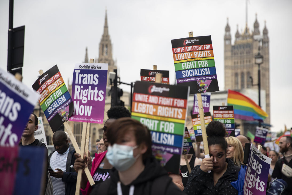 LONDON, UNITED KINGDOM - 2021/07/24: LGBT+ activists holds placards while marching from Parliament Square to Hyde Park during the demonstration.
LGBT+ community-led march protest for LGBT+ rights, with five key LGBT+ liberation demands, Ban LGBT+ conversion therapy, Reform the Gender Recognition Act, Safe haven for LGBT+ refugees,  Decriminalization of LGBT+ people worldwide and Solidarity with Black Lives Matter. (Photo by May James/SOPA Images/LightRocket via Getty Images)