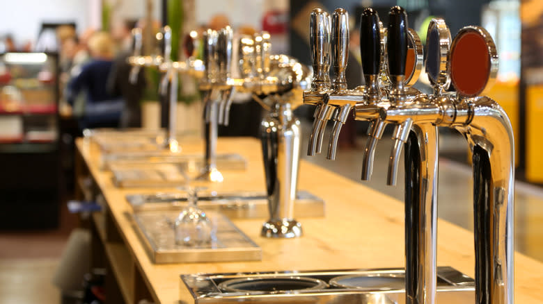 Line of draft beer taps