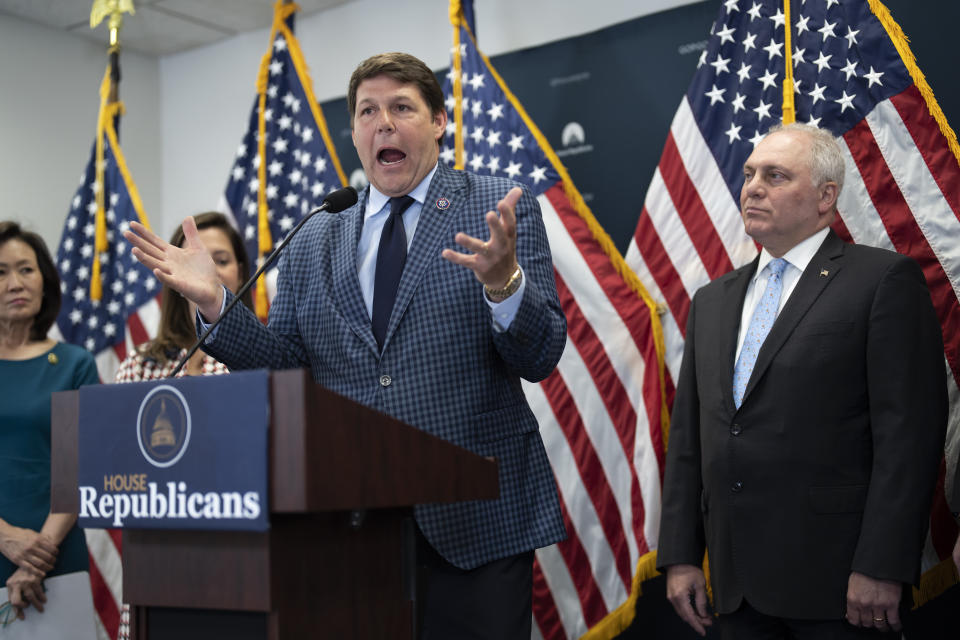 House Budget Committee Chairman Jodey Arrington, R-Texas, speaks as House Majority Leader Steve Scalise, R-La., listens at right, as House Republicans push their sweeping debt ceiling package to win over holdouts in their party, at the Capitol in Washington, Wednesday, April 26, 2023. Speaker of the House Kevin McCarthy, R-Calif., is struggling to round up the votes for the bill, which would couple an increase of the country's debt ceiling with restrictions on federal spending. A final vote on the package is likely Thursday. (AP Photo/J. Scott Applewhite)