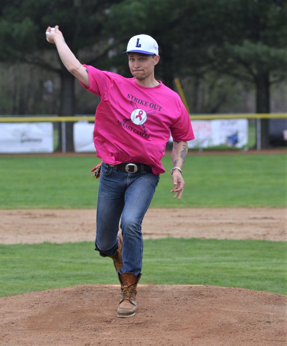Lakeview alum and country singer Frankie Ballard is back in town to help the school celebrate its centennial. Ballard, who was a member of the Lakeview 2000 baseball state title team, threw out the first pitch at a Spartan game on Thursday.