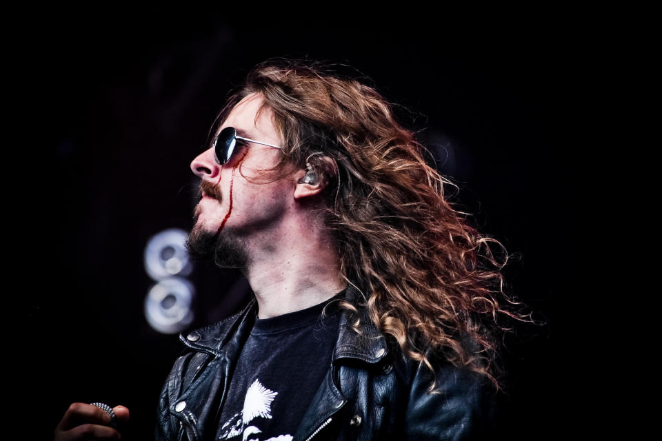 Mikael Åkerfeldt performing with Bloodbath at Bloodstock, 2010