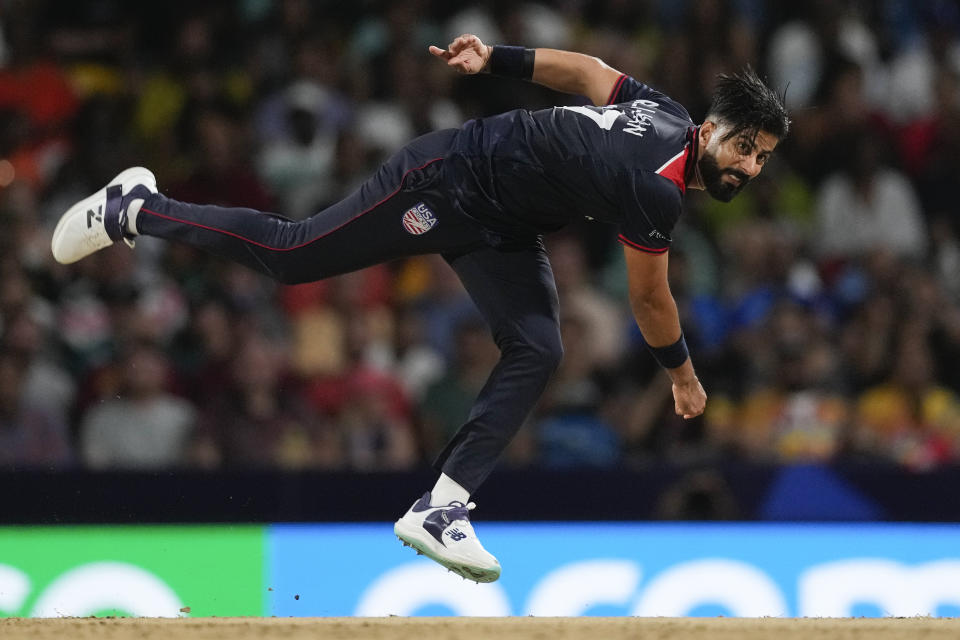 United States' Muhammad Ali-Khan bowls during the men's T20 World Cup cricket match between the USA and the West Indies at Kensington Oval, Bridgetown, Barbados, Friday, June 21, 2024. (AP Photo/Ricardo Mazalan)