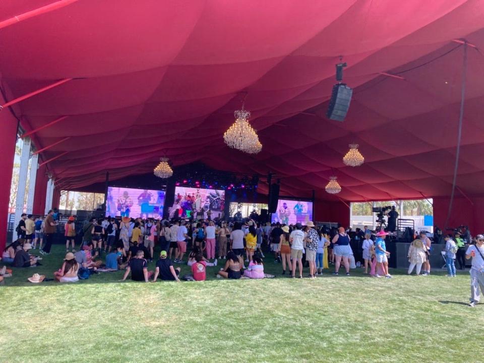 A long line at the merchandise tent early on day one of the 2023 Coachella Music and Arts Festival.