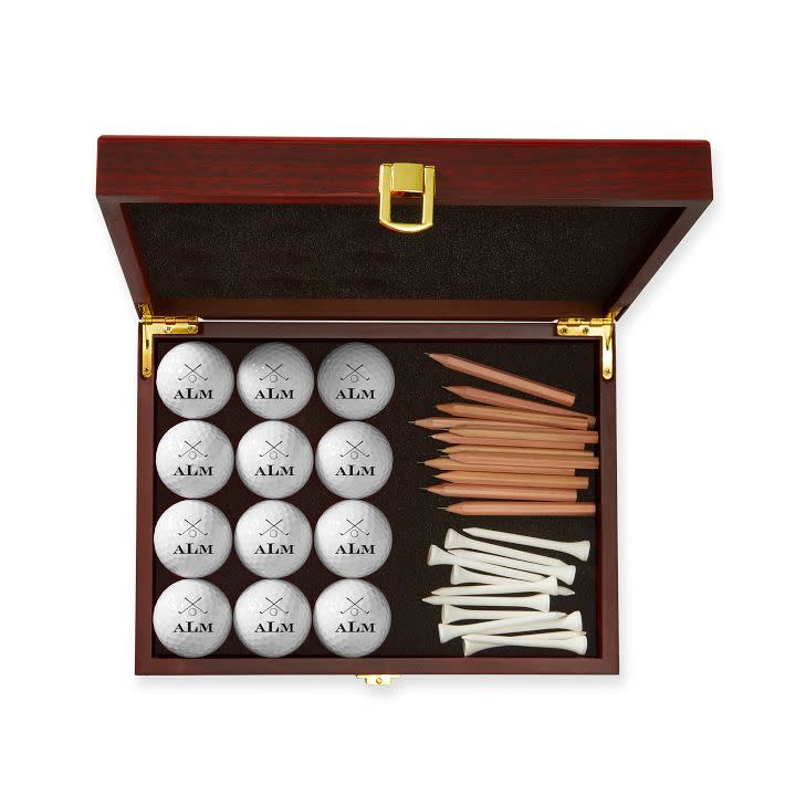 <p><a href="https://go.redirectingat.com?id=74968X1596630&url=https%3A%2F%2Fwww.markandgraham.com%2Fproducts%2Fmonogrammed-golf-ball-gift-set%2F%3FcatalogId%3D57%26sku%3D1499928%26cm_ven%3DPLA%26cm_cat%3DGoogle%26cm_pla%3DHome%2B%253E%2BGames%26cm_ite%3D1499928_20083128677__Pmax%26gad_source%3D1%26gclid%3DCjwKCAjwrIixBhBbEiwACEqDJe237MVzOX_95f-gVROKqg_jNI4lQFjhnAUQJZuMHvZhYXAxits1mhoCp8IQAvD_BwE&sref=https%3A%2F%2Fwww.thepioneerwoman.com%2Fholidays-celebrations%2Fgifts%2Fg60549194%2Fbest-golf-gifts%2F" rel="nofollow noopener" target="_blank" data-ylk="slk:Shop Now;elm:context_link;itc:0;sec:content-canvas" class="link ">Shop Now</a></p><p>Personalized Golf Ball Gift Set</p><p>markandgraham.com</p><p>$25.00</p><span class="copyright">Mark and Graham</span>