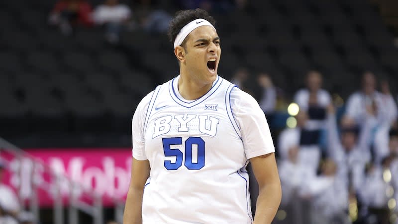 Brigham Young Cougars center Aly Khalifa (50) celebrates a 3-pointer during the Big 12 conference tournament against UCF in Kansas City, Missouri, on Wednesday, March 13, 2024.