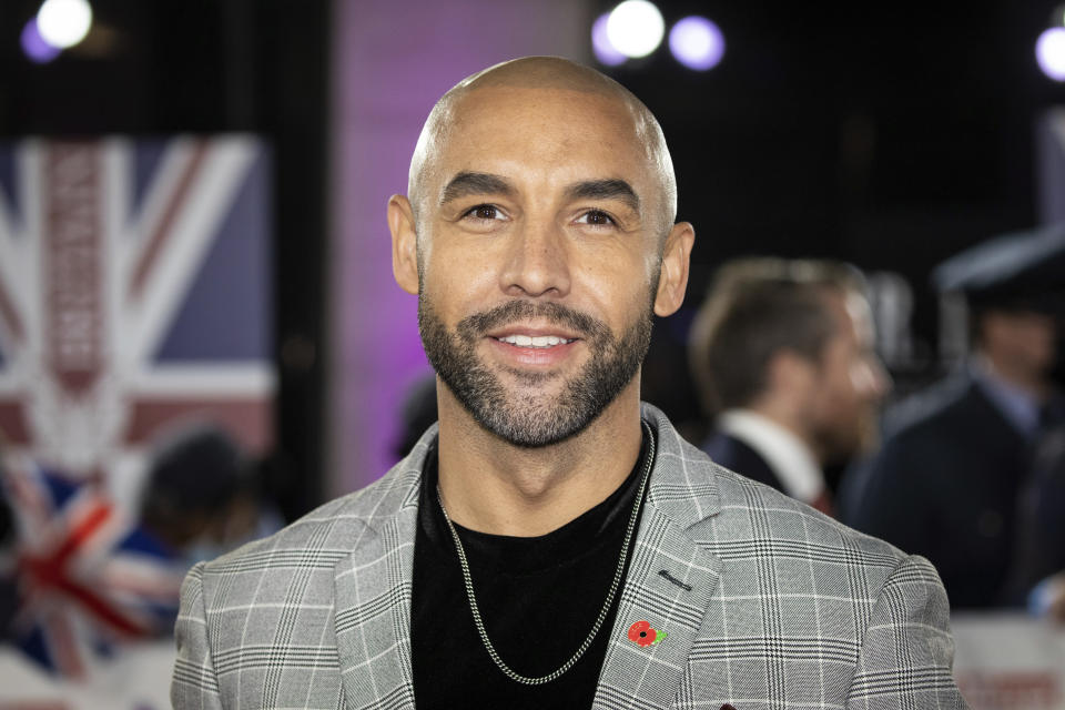 Alex Beresford poses for photographers upon arrival at the Pride of Britain Awards on Saturday, Oct. 30, 2021 in London. (Photo by Vianney Le Caer/Invision/AP)