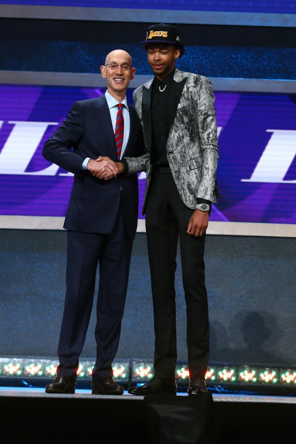 <p>BROOKLYN, NY – JUNE 23: Brandon Ingram shakes hands with NBA Commissioner Adam Silver after being selected second overall by the Los Angeles Lakers during the 2016 NBA Draft on June 23, 2015 at Barclays Center in Brooklyn, New York. (Photo by Nathaniel S. Butler /NBAE via Getty Images) </p>