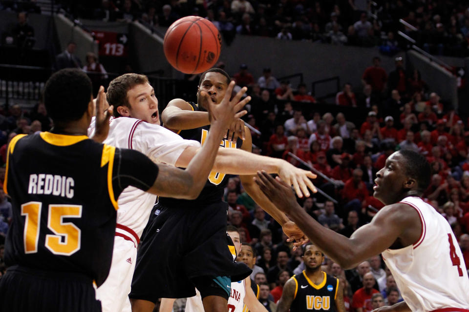 PORTLAND, OR - MARCH 17: Bradford Burgess #20 of the Virginia Commonwealth Rams passes the ball to Juvonte Reddic #15 against the Indiana Hoosiers in the second half during the third round of the 2012 NCAA Men's Basketball Tournament at the Rose Garden Arena on March 17, 2012 in Portland, Oregon. (Photo by Jonathan Ferrey/Getty Images)