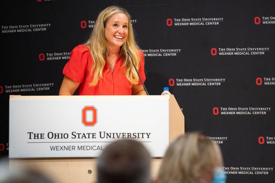 Aug 3, 2022; Columbus, OH, USA;  Nina Day talks about her experience with anxiety during a press conference, where she and her husband, head football coach Ryan Day, announce a $1 million donation to fund research and services that promote mental health at The Ohio State University Wexner Medical Center and College of Medicine. The Nina and Ryan Day Resilience Fund will be housed in the Department of Psychiatry and Behavioral Health.