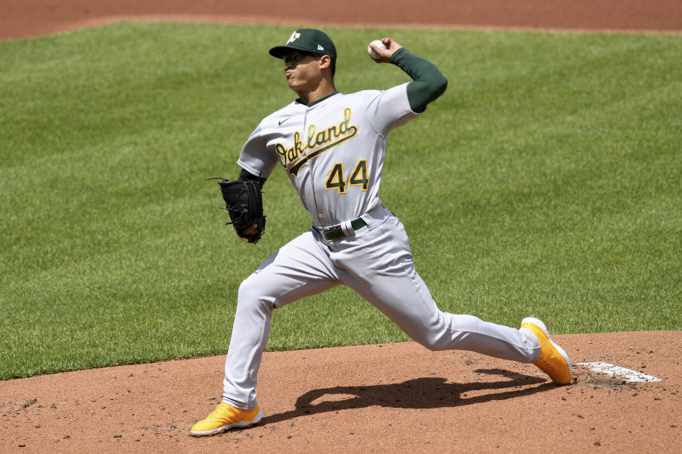 Oakland Athletics starting pitcher Jesus Luzardo (44) throws against the Baltimore Orioles in the first inning of a baseball game, Sunday, April 25, 2021, in Baltimore. (AP Photo/Will Newton)