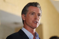 FILE - In this Tuesday, May 11, 2021, file photo, California Gov. Gavin Newsom speaks at a news conference at the Kearney Vista Apartments in San Diego, about a $12 billion package bolstering the state's response to the homelessness crisis. A fading coronavirus crisis and an astounding windfall of tax dollars have reshuffled California's emerging recall election, allowing Democratic Gov. Newsom to talk of a mask-free future and propose billions in new spending for schools and businesses as he looks to fend off Republicans who depict him as a foppish failure. (K.C. Alfred/The San Diego Union-Tribune via AP, File)